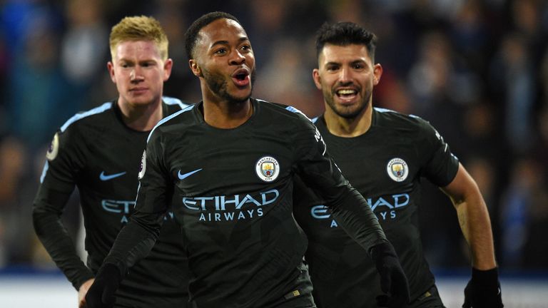 Manchester City's English midfielder Raheem Sterling celebrates after scoring their second goal during the English Premier League football match between Hu