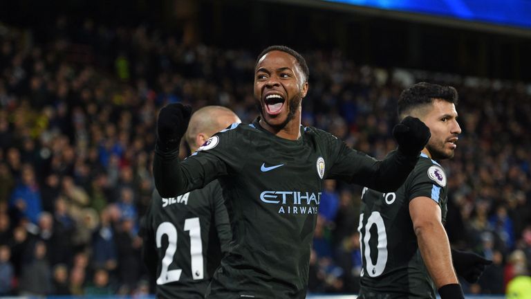 Manchester City's English midfielder Raheem Sterling celebrates after scoring their second goal during the English Premier League football match between Hu