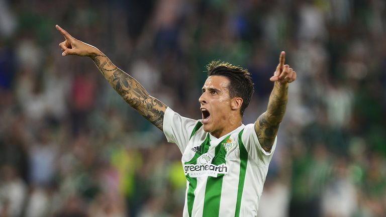 Real Betis' Spanish forward Cristian Tello (C) celebrates after scoring a goal during the Spanish league football match Real Betis FC vs Valencia FC at the