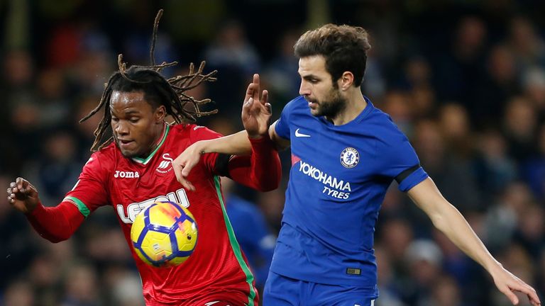 Renato Sanches and Cesc Fabregas in action at Stamford Bridge