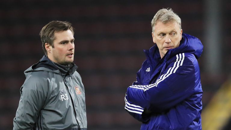 BURNLEY, ENGLAND - JANUARY 17: Robbie Stockdale, Sunderland first team coach speaks to David Moyes, Manager of Sunderland (R) on the pitch prior to the Emi