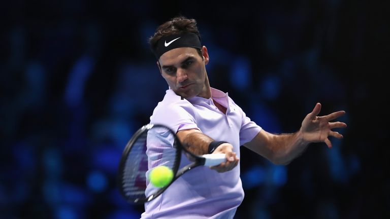 LONDON, ENGLAND - NOVEMBER 16:  Roger Federer of Switzerland plays a forehand in his Singles match against Marin Cilic of Croatia during day five of the Ni