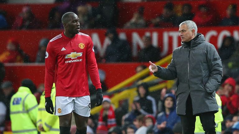 MANCHESTER, ENGLAND - NOVEMBER 25:  Romelu Lukaku speaks with Jose Mourinho, Manager of Manchester United during the Premier League match between Mancheste