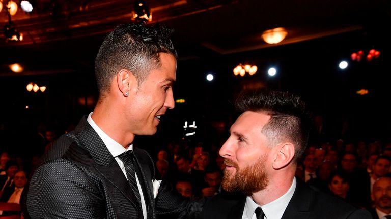 Nominees for the Best FIFA football player, Barcelona and Argentina forward Lionel Messi (R) and Real Madrid and Portugal forward Cristiano Ronaldo (L) cha