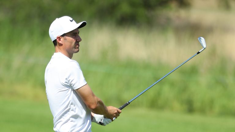 SUN CITY, SOUTH AFRICA - NOVEMBER 10:  Ross Fisher of England hits his second shot on the 18th hole during the second round of the Nedbank Golf Challenge a
