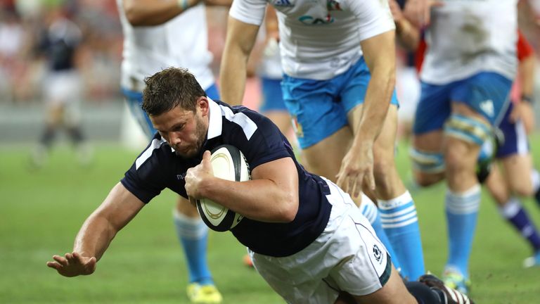SINGAPORE, SINGAPORE - JUNE 10: Ross Ford of Scotland scores a try during the International Test match between Italy and Scotland at Singapore National Sta