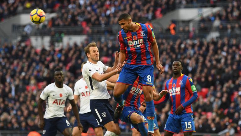 LONDON, ENGLAND - NOVEMBER 05:  Ruben Loftus-Cheek of Crystal Palace and  Harry Kane of Tottenham Hotspur battle for possession in the air during the Premi