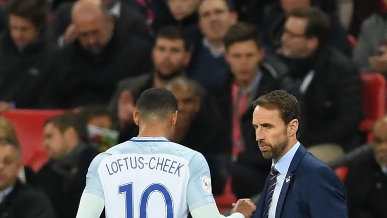 LONDON, ENGLAND - NOVEMBER 14: Ruben Loftus-Cheek of England and Gareth Southgate Manager of England shake hands after he is subbed during the internationa