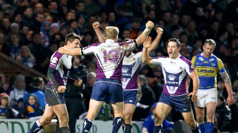Melbourne celebrate their victory over Leeds Rhinos in 2013