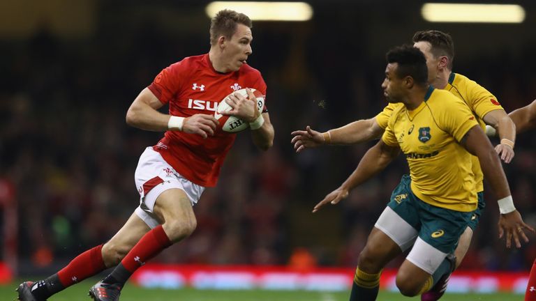 CARDIFF, WALES - NOVEMBER 11: Liam Williams of Wales is closed down by Will Genia and Bernard Foley of Australia during the Autumn International between Wa