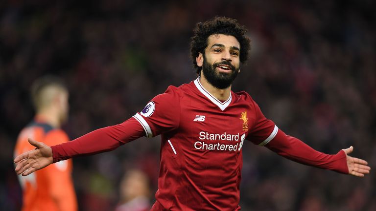 Liverpool's Egyptian midfielder Mohamed Salah celebrates scoring his team's second goal during the English Premier League football match between Liverpool 