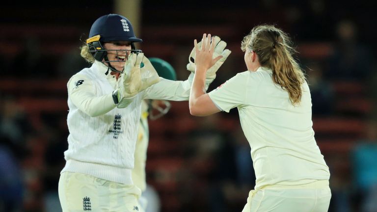 England celebrate the dismissal of Elyse Villani during day two of the Women's Test match between Australia and England