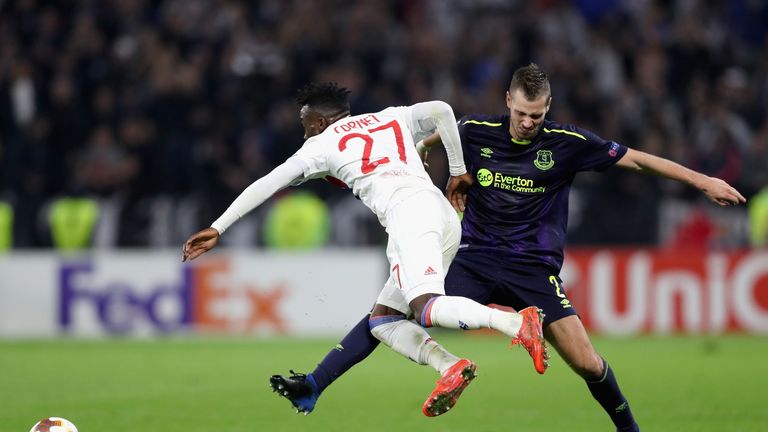 LYON, FRANCE - NOVEMBER 02: Morgan Schneiderlin of Everton fouls Maxwel Cornet of Lyon and is later awarded his second yellow of the game which led to his 