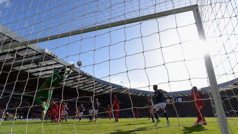 GLASGOW, SCOTLAND - JUNE 10: Craig Gordon of Scotland makes a save during the FIFA 2018 World Cup Qualifier between Scotland and England at Hampden Park.