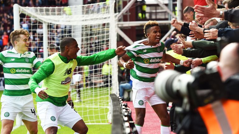 Scott Sinclair (R) celebrates after he comes off the bench to give Brendan Rodgers a win in his first domestic match in charge of Celtic. 