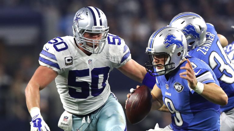 ARLINGTON, TX - DECEMBER 26: Sean Lee #50 of the Dallas Cowboys closes in on Matthew Stafford #9 of the Detroit Lions during the second half at AT&T Stadiu