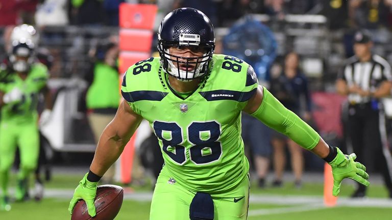 GLENDALE, AZ - NOVEMBER 09:  Tight end Jimmy Graham #88 of the Seattle Seahawks celebrates a six yard touchdown against the Arizona Cardinals in the first 