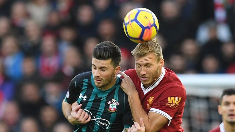 Shane Long vies for possession with Ragnar Klavan