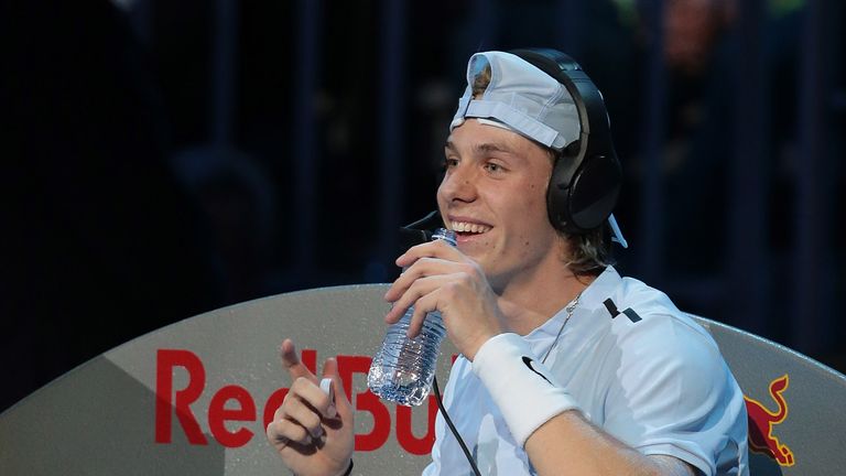 MILAN, ITALY - NOVEMBER 07:  Denis Shapovalov of Canada speaks with his coach during time out through the headphones during Day 1 of the Next Gen ATP Final