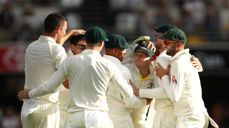 BRISBANE, AUSTRALIA - NOVEMBER 25:  Steve Smith of Australia celebrates after taking a catch to dismiss James Vince of England off the bowling of Josh Hazl