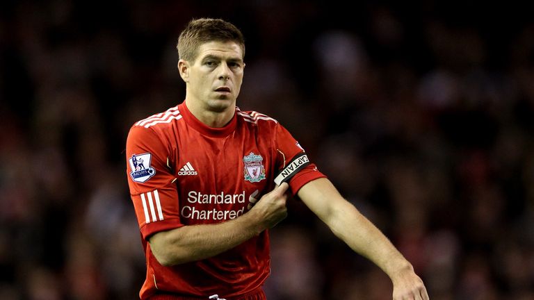 LIVERPOOL, ENGLAND - DECEMBER 26:  Steven Gerrard of Liverpool puts on the captain's armband during the Barclays Premier League match between Liverpool and