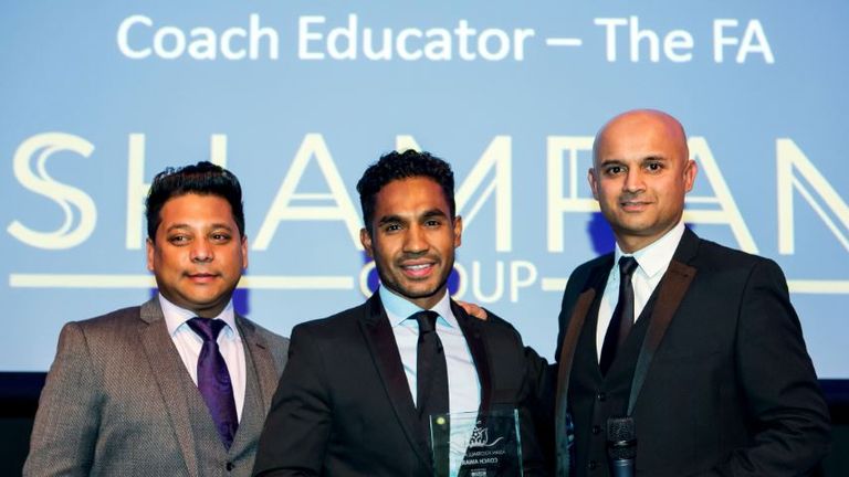 Taff Rahman (c) is presented with the Coach award  by Sky Sports News reporter Dharmesh Sheth (pic: Punjab 2000)
