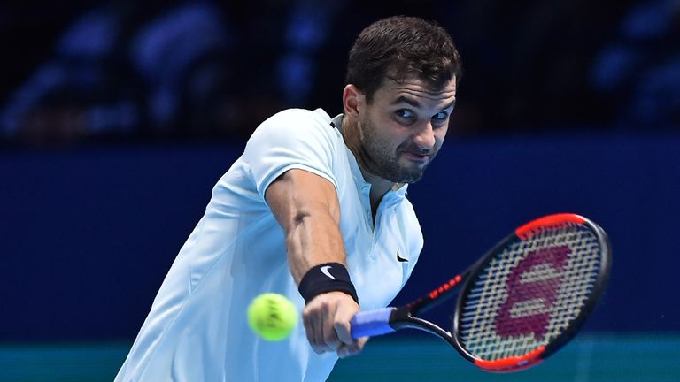 Bulgaria's Grigor Dimitrov returns to Spain's Pablo Carreno Busta during their men's singles round-robin match on day six of the ATP Finals