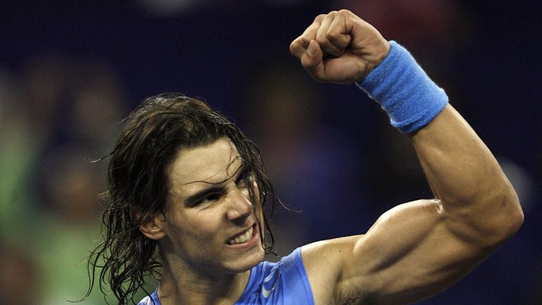 World number two Rafael Nadal of Spain celebrates after beating Richard Gasquet of France in the first match of the Masters Cup in Shanghai