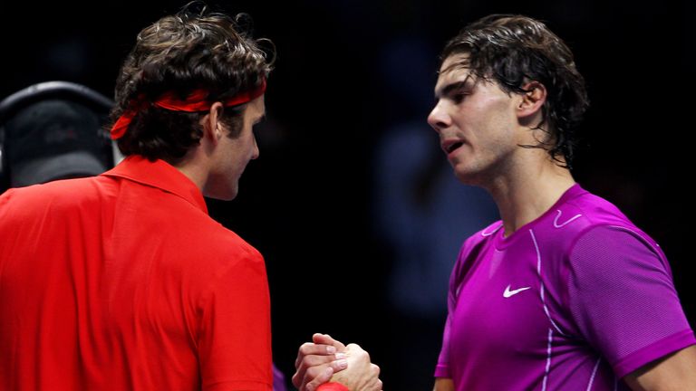 Roger Federer (L) of Switzerland is congratulated by Rafael Nadal of Spain after their men's final match during the ATP World Tour Finals