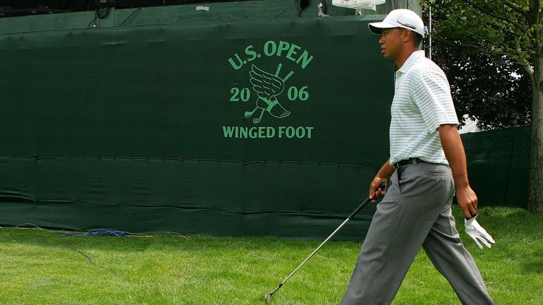 MAMARONECK, NY - JUNE 12:  Tiger Woods walks out onto the driving range during the Monday practice round for the 2006 US Open Championship at Winged Foot G
