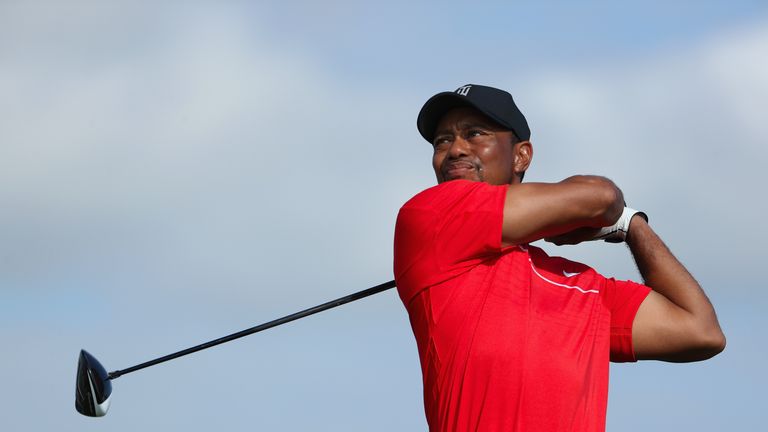 NASSAU, BAHAMAS - DECEMBER 04:  Tiger Woods of the United States hits his tee shot on the 13th hole during the final round of the Hero World Challenge at A