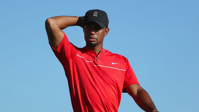 NASSAU, BAHAMAS - DECEMBER 04:  Tiger Woods of the United States looks on as he walks off the 18th hole during the final round of the Hero World Challenge 