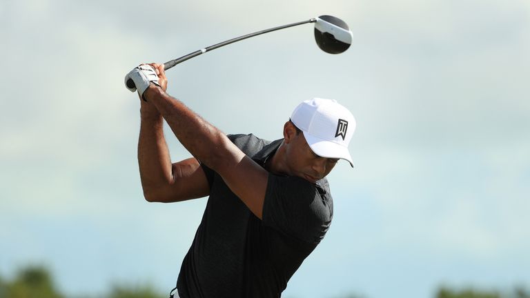 NASSAU, BAHAMAS - NOVEMBER 30:  Tiger Woods of the United States warms up on the range for the first round of the Hero World Challenge at Albany, Bahamas o