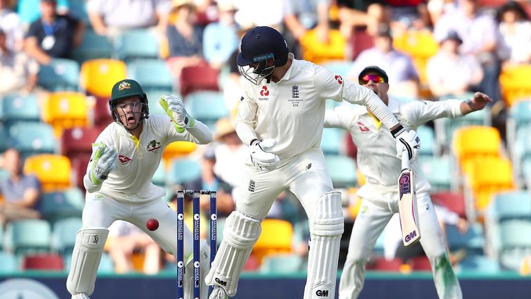 BRISBANE, AUSTRALIA - NOVEMBER 23:  Tim Paine (L) of Australia drops a chance from the edge of James Vince of England  during day one of the First Test Mat