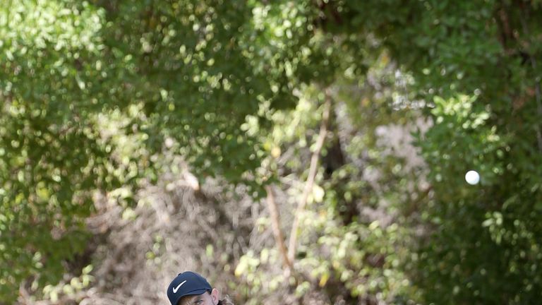 Tommy Fleetwood of England plays a shot during the third round of the DP World Tour Championship at Jumeirah Golf Estates in Dubai on November 18, 2017. / 