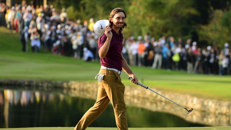Tommy Fleetwood of England pose with the trophy after winning the UBS Hong Kong Open at The Hong Kong Golf Club 