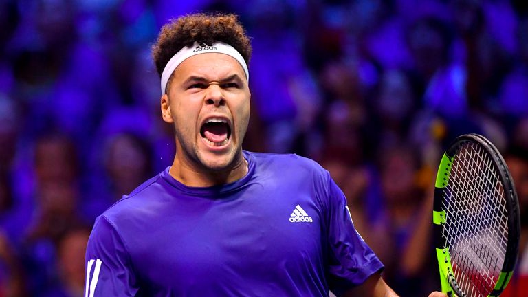 France's Jo-Wilfried Tsonga reacts after winning a point against Belgium's Steve Darcis during the Davis Cup World Group singles rubber final tennis match 