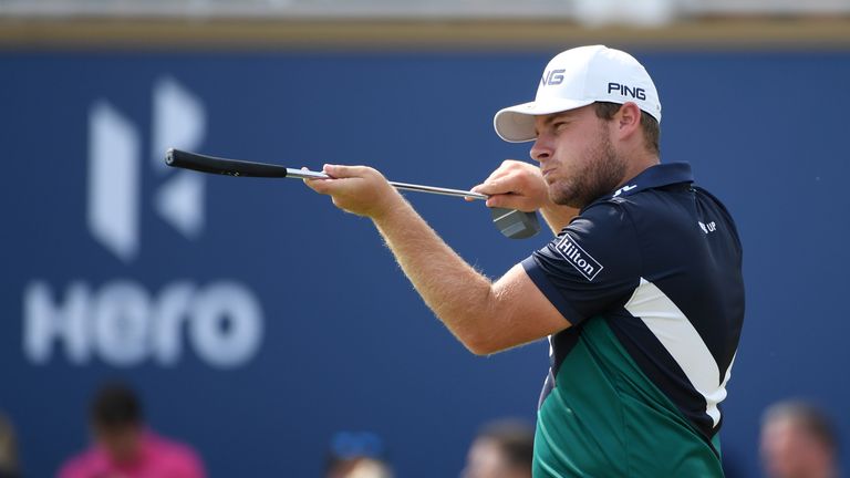 DUBAI, UNITED ARAB EMIRATES - NOVEMBER 17:  Tyrrell Hatton of England takes aim at a bunker on the 18th hole during the second round of the DP World Tour C