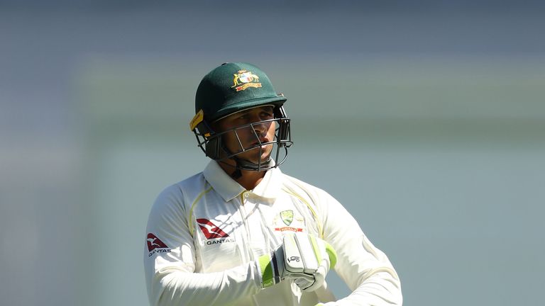 Usman Khawaja of Australia looks dejected after being dismissed by Moeen Ali of England during day two