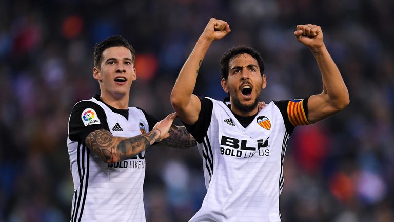 Santi Mina (L) and Dani Parejo celebrate Valencia's win at Espanyol