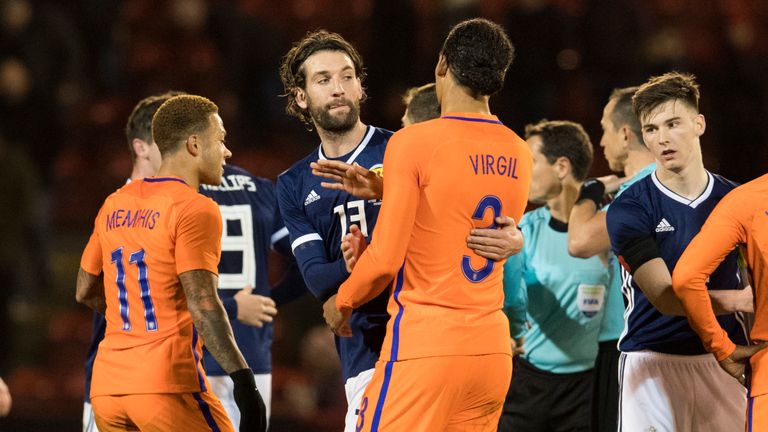 09/11/17 SCOTLAND v THE NETHERLANDS (0-1) friendly. PITTODRIE . Scotland's Charlie Mulgrew (2nd from left) with former Celtic team-mate Virgil van Dijk.