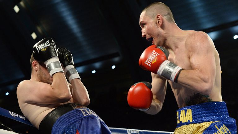 Vyacheslav Shabranskyy (R) of Ukraine fights with Emil Gonzalez of Puerto Rico