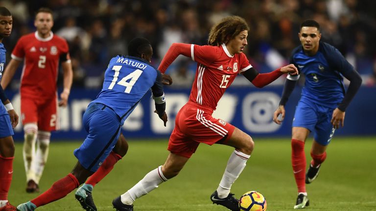 France's midfielder Blaise Matuidi vies for the ball with Wales' defender Ethan Ampadu (2nd R) during the friendly football match between France and Wales 
