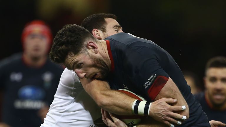 Wales' wing Alex Cuthbert battles against Georgia at the Principality stadium in Cardiff