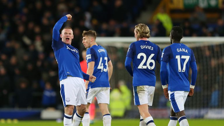 Wayne Rooney pumps his fist after scoring his hat-trick