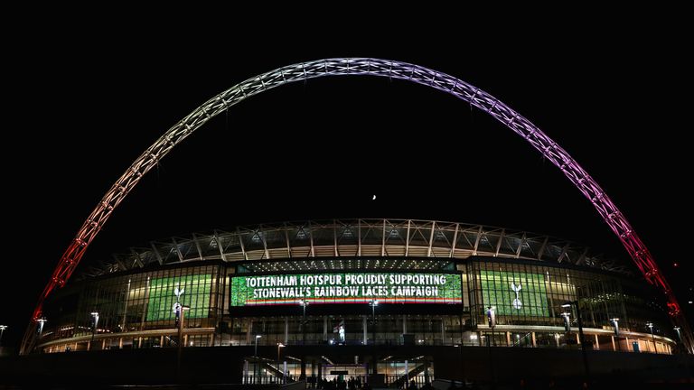 LONDON, ENGLAND - NOVEMBER 25:  The Wembley arch lights up in rainbow colours for the Stonewall Rainbow Laces campaign after the Premier League match betwe