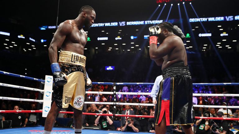 NEW YORK, NY - NOVEMBER 04:  Deontay Wilder stares down Bermane Stiverne after knocking him down and the fight resumed in the first round during their rema