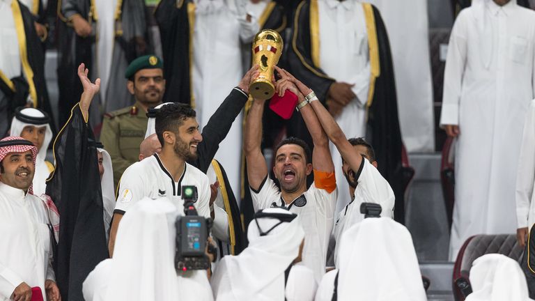 Xavi, captain of Al Sadd, celebrates winning the 2017 Emir Cup at Khalifa International  Stadium on May 19, 2017