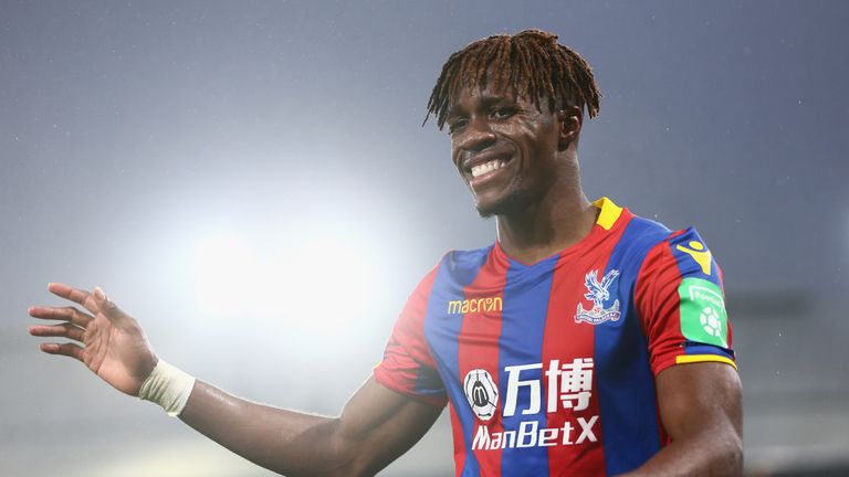 Wilfried Zaha reacts to a missed opportunity against Everton