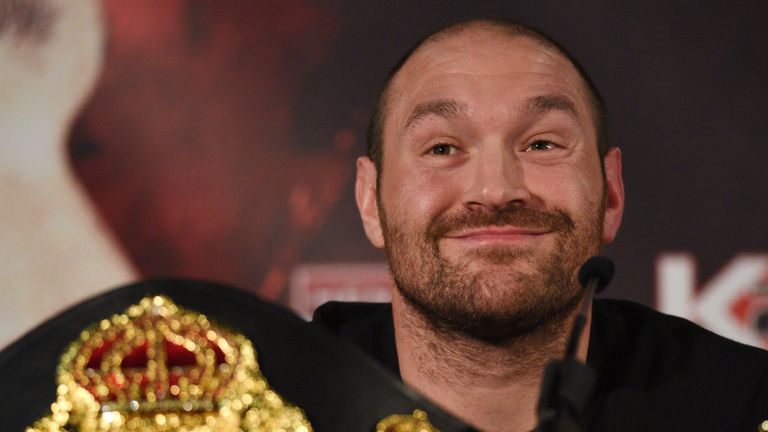 British heavyweight boxer Tyson Fury reacts during a press conference to publicise his forthcoming world heavyweight title fight against Ukranian heavyweig